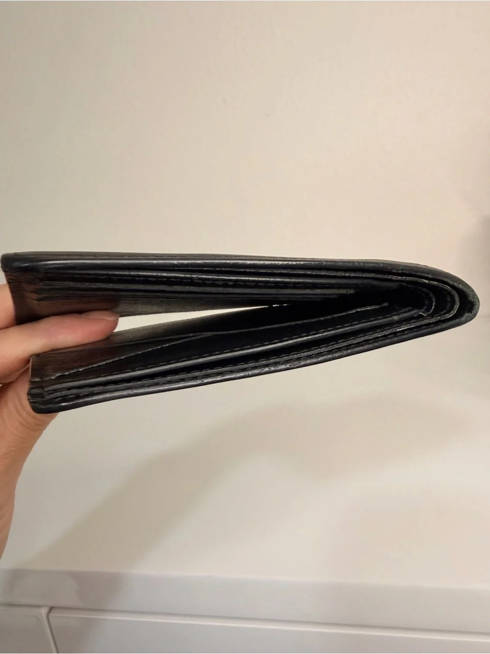 Authentic Louis Vuitton Black Epi Leather Bi-Fold Wallet
